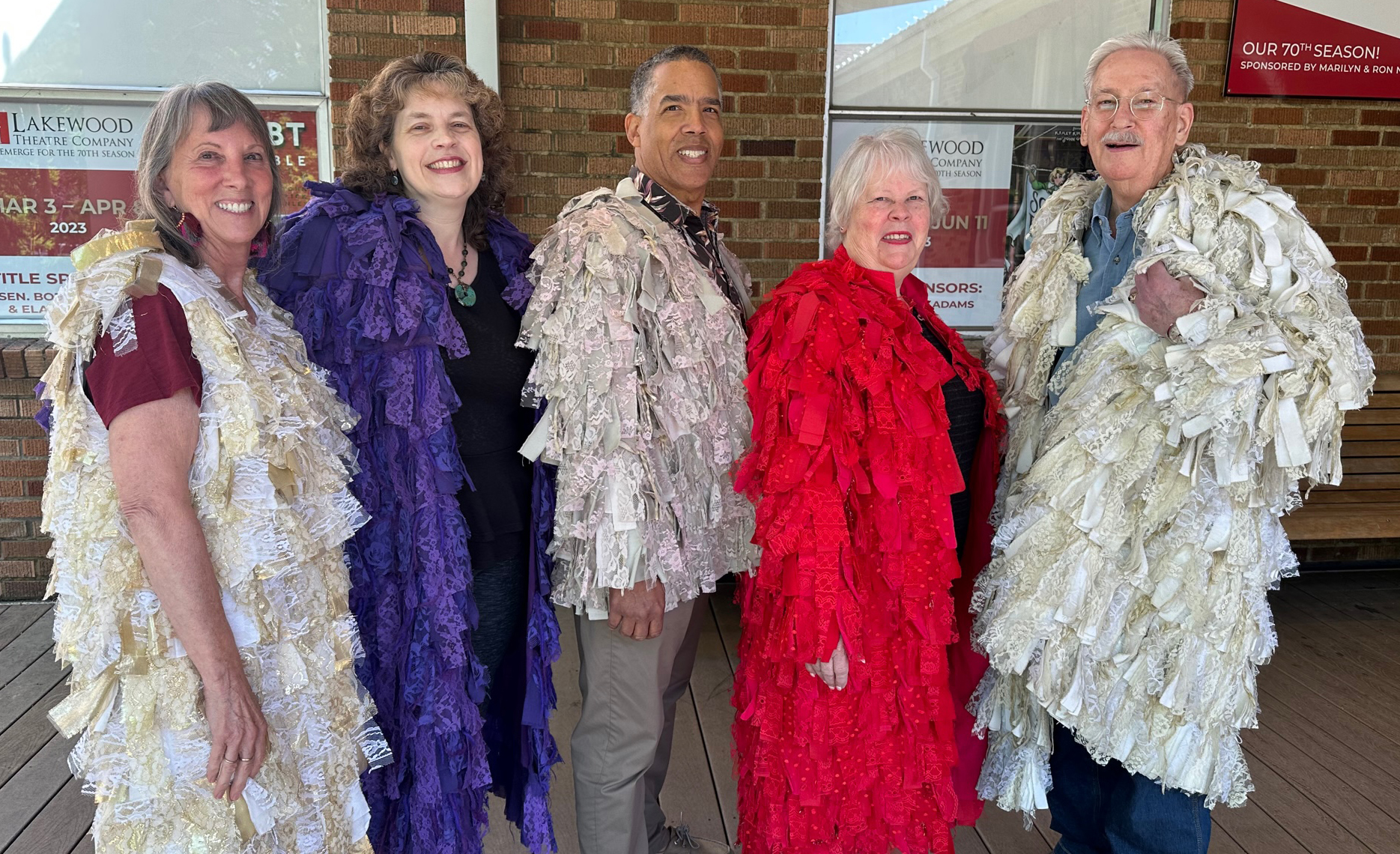 The Curation Team in Phyllis Yes' Lace Coats